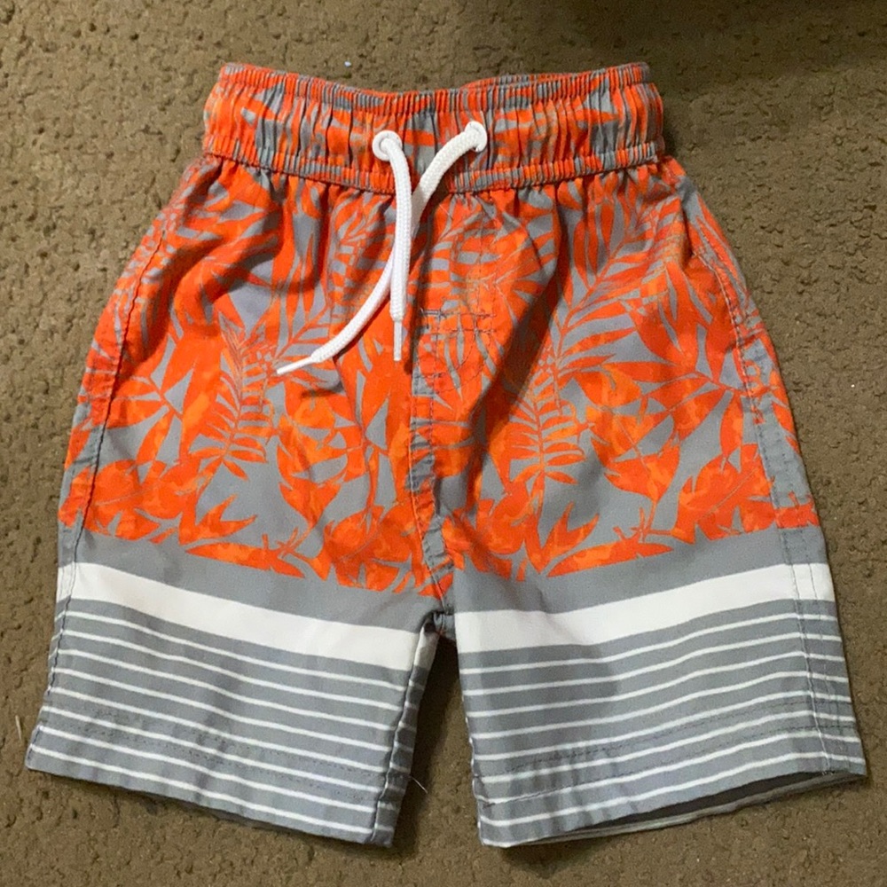 Orange and gray swim trunks